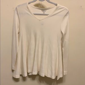 Cream colored flowing top.